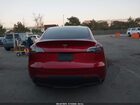 2024 Tesla Model Y Rwd Burgundy vin: 7SAYGDED6RF129542