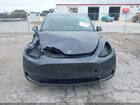 2025 Tesla Model Y Long Range Dual Motor All-wheel Drive Gray vin: 7SAYGDEE0SA354468