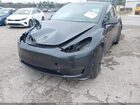 2025 Tesla Model Y Long Range Dual Motor All-wheel Drive Gray vin: 7SAYGDEE0SA354468