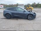 2025 Tesla Model Y Long Range Dual Motor All-wheel Drive Gray vin: 7SAYGDEE0SA354468
