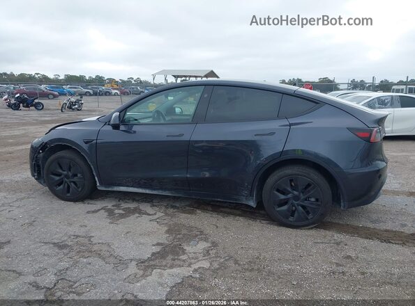 7SAYGDEE0SA354468 2025 TESLA MODEL Y Gray Սալոնի հետևի տեսք