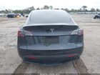 2025 Tesla Model Y Long Range Dual Motor All-wheel Drive Gray vin: 7SAYGDEE0SA354468