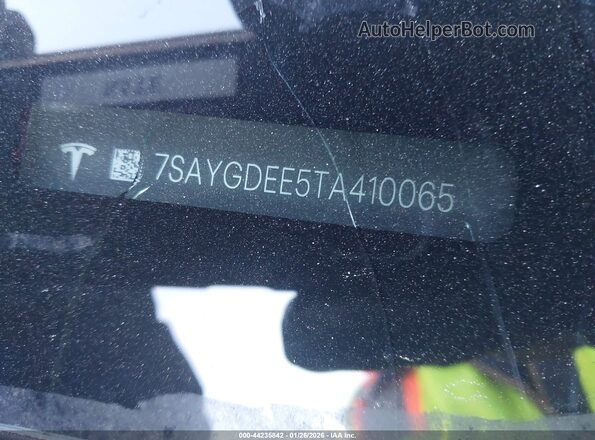 7SAYGDEE5TA410065 2026 TESLA MODEL Y Red VIN sticker view