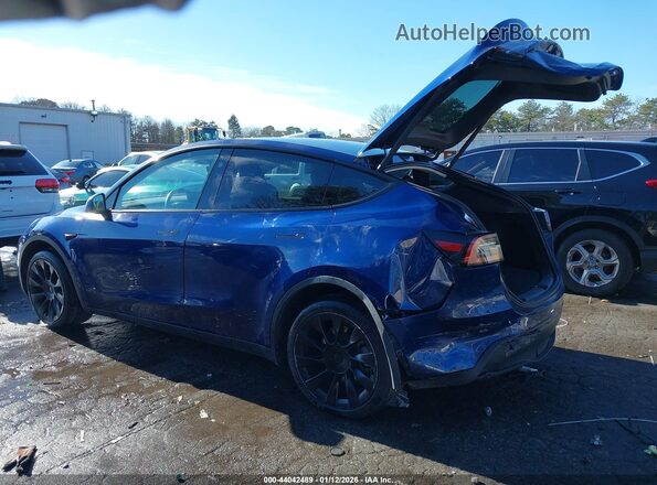 7SAYGDEE6RA220297 2024 TESLA MODEL Y Blue Tył lewy