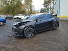 2026 Tesla Model Y Black vin: 7SAYGDEE6TF414824
