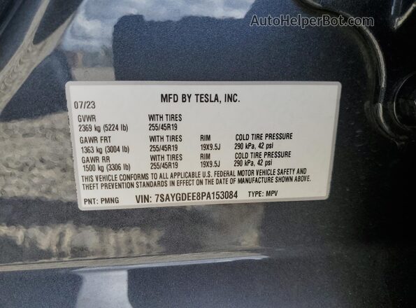7SAYGDEE8PA153084 2023 TESLA MODEL Charcoal VIN კოდის სტიკერის ხედი