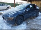 2025 Tesla Model Y Long Range Dual Motor All-wheel Drive Gray vin: 7SAYGDEE8SA367257