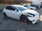2024 Tesla Model Y Performance Dual Motor All-wheel Drive White vin: 7SAYGDEF0RF072790
