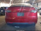 2025 Tesla Model Y Performance Dual Motor All-wheel Drive Red vin: 7SAYGDEFXSA352414