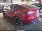 2025 Tesla Model Y Performance Dual Motor All-wheel Drive Red vin: 7SAYGDEFXSA352414