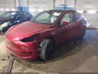 2025 Tesla Model Y Performance Dual Motor All-wheel Drive Red vin: 7SAYGDEFXSA352414