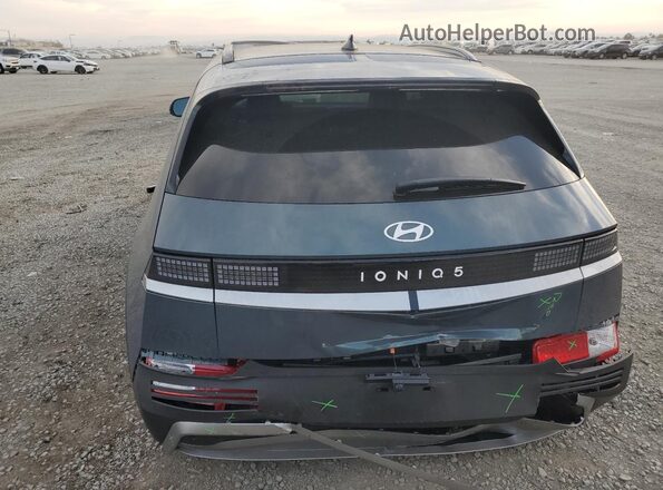 7YAKN4DA1SY035969 2025 HYUNDAI IONIQ Серый Вид сзади