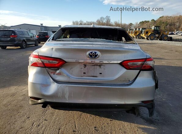 4T1B31HK0KU511467 2019 TOYOTA LE Серебряный Вид салона спереди