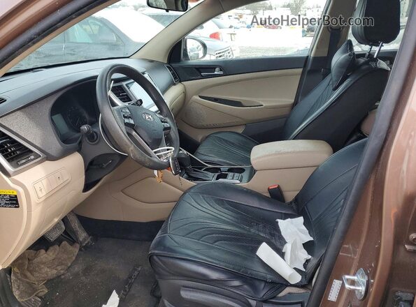 KM8J23A46HU438264 2017 HYUNDAI TUCSON Коричневый Вид панели приборов