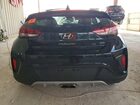 2020 Hyundai Veloster Base Черный vin: KMHTG6AF1LU029613