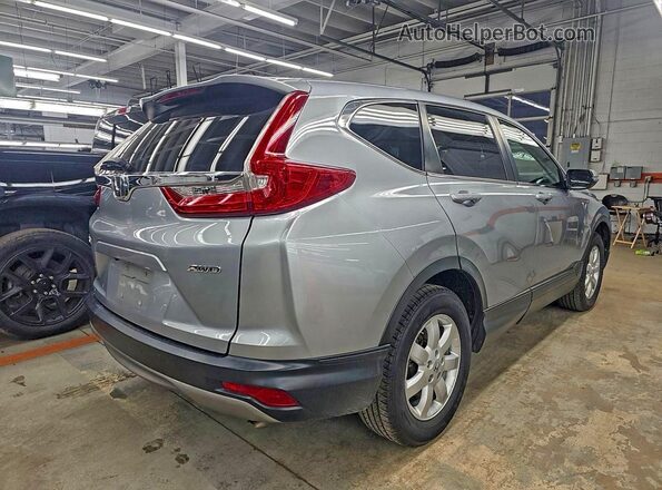 7FARW2H57KE010518 2019 HONDA CRV Серебряный Вид спереди