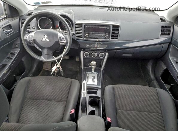 JA32U2FU8GU009940 2016 MITSUBISHI LANCER Белый Вид панели приборов