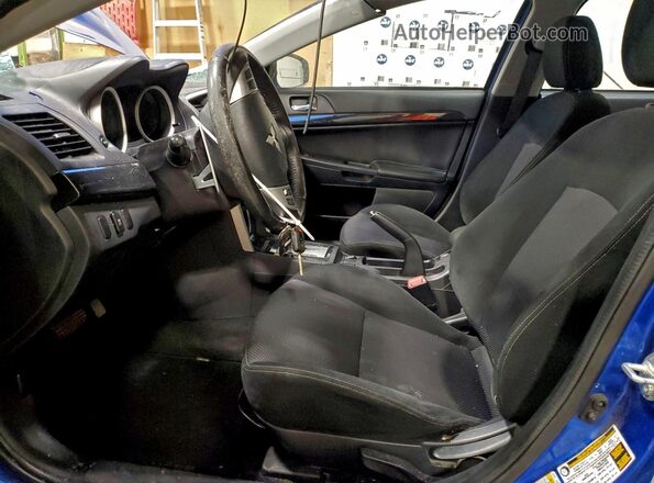 JA32V2FW7GU601800 2016 MITSUBISHI LANCER Синий Вид салона спереди