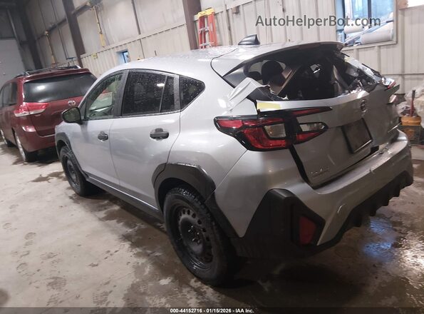 JF2GUABC7R8299762 2024 SUBARU CROSSTREK Silver Trasero izquierdo