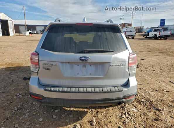 JF2SJAGC8HH471016 2017 SUBARU FORESTER2. Silver Vista trasera