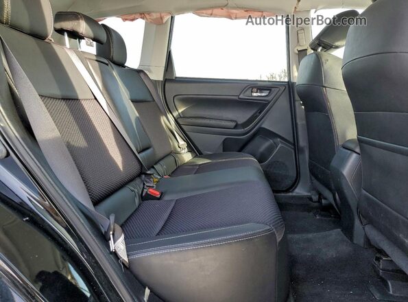 JF2SJGEC6HH418210 2017 SUBARU FORESTER2. Black Vista interior trasera