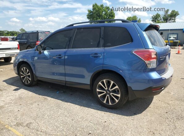 JF2SJGEC9JH415355 2018 SUBARU FORESTER2. Синий Задняя левая четверть