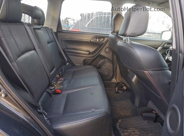 JF2SJGVC3GH538173 2016 SUBARU FORESTER2. Charcoal Vista de los asientos traseros