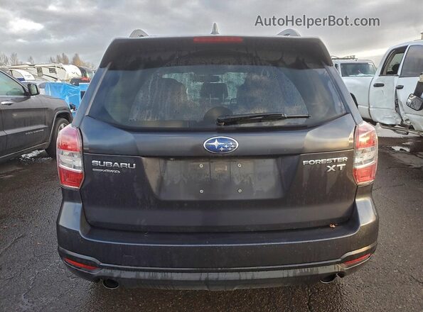 JF2SJGVC3GH538173 2016 SUBARU FORESTER2. Charcoal Vista trasera
