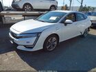2018 Honda Clarity Plug-in Hybrid   White vin: JHMZC5F19JC018197