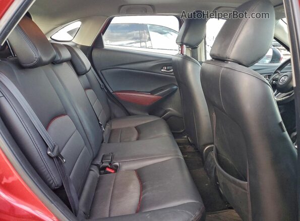 JM1DKDC72H0142969 2017 MAZDA CX-3 Red Widok wnętrza z tyłu