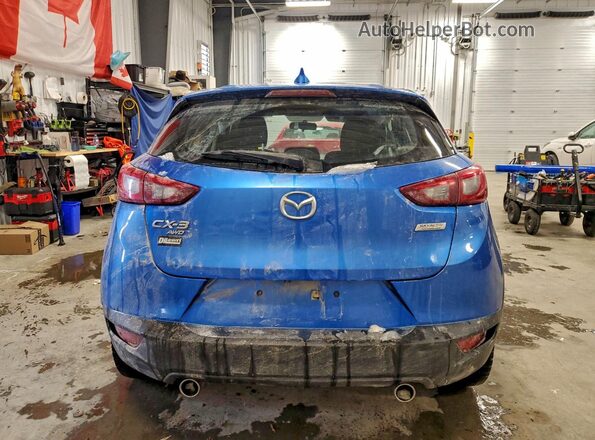 JM1DKFB79H0167977 2017 MAZDA CX-3 Blue Widok z tyłu