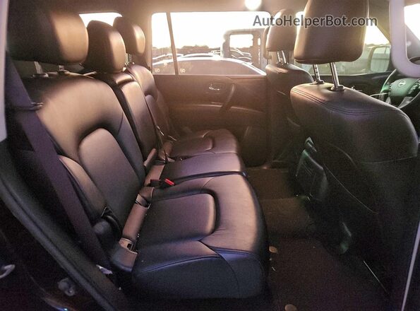 JN8AY2ACXM9145490 2021 NISSAN ARMADA Black Widok tylnych siedzeń