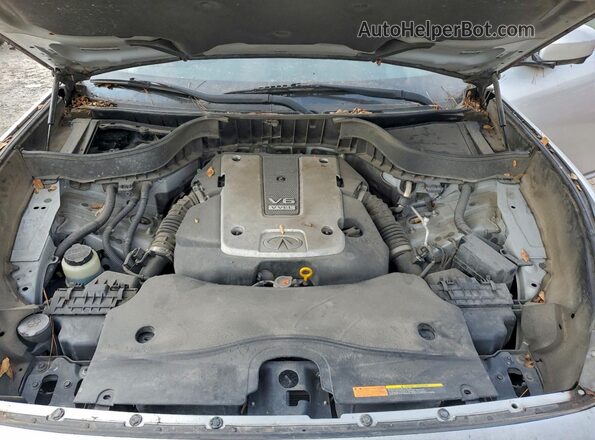 JN8CS1MU2GM130086 2016 INFINITI QX70 Серебряный Вид задней части салона