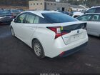 2021 Toyota Prius L Eco Белый vin: JTDKAMFUXM3151813