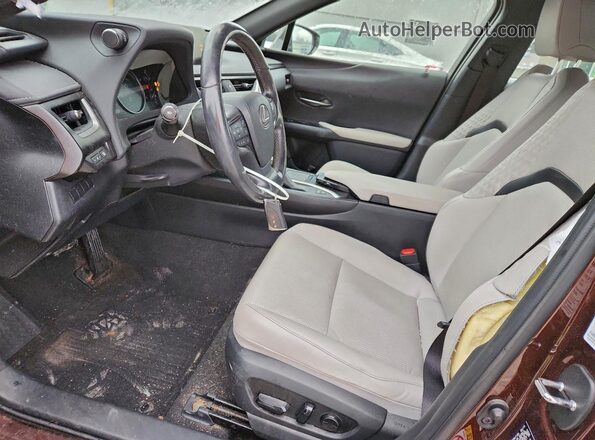 JTHU9JBH3K2007255 2019 LEXUS UX Коричневый Вид салона спереди