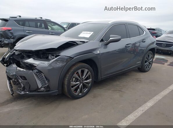 JTHU9JBH4K2002601 2019 LEXUS UX 250H Серый Передняя левая четверть