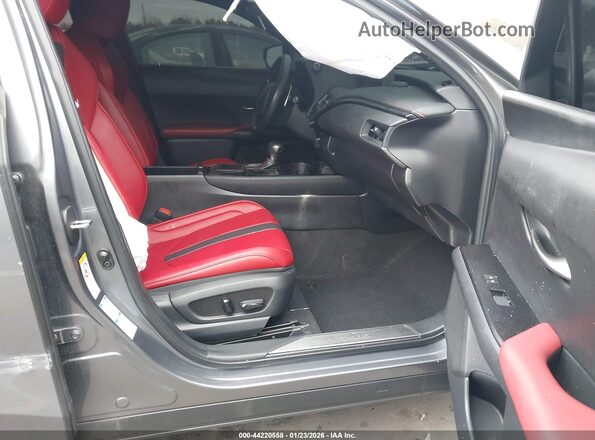 JTHU9JBH4K2002601 2019 LEXUS UX 250H Серый Вид салона спереди