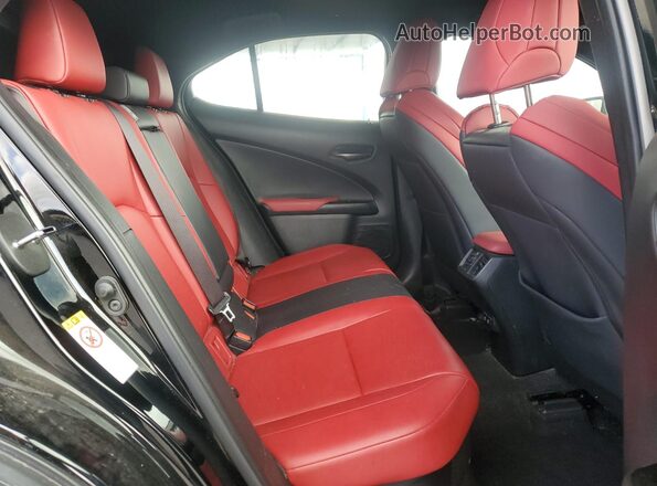 JTHU9JBH9K2017692 2019 LEXUS UX Black Vista de los asientos traseros