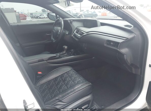 JTHX9JBH9L2035902 2020 LEXUS UX 250H Белый Вид салона спереди
