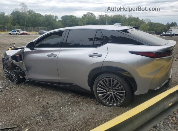 JTJAAAAB1PA002302 2023 LEXUS RZ Серебряный Задняя левая четверть