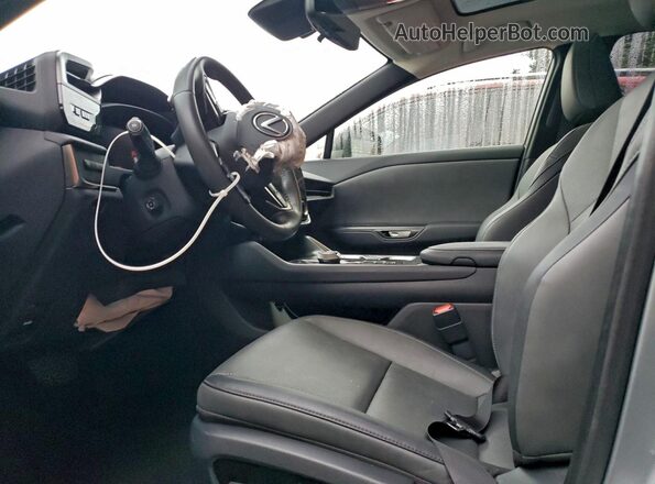 JTJAAAAB6PA017992 2023 LEXUS RZ Серебряный Вид салона спереди