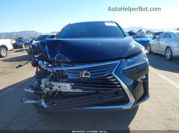 JTJDZKCA6J2011630 2018 LEXUS RX 350L Черный Вид щитка приборов