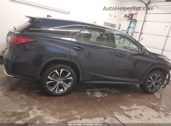 JTJDZKCA9J2010052 2018 LEXUS RX 350L Dark Blue Widok wnętrza z tyłu