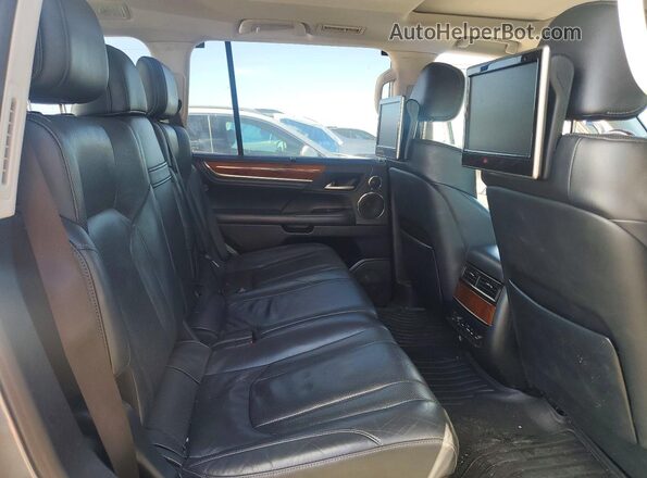 JTJHY7AX4J4263423 2018 LEXUS LX Серый Вид задней части салона