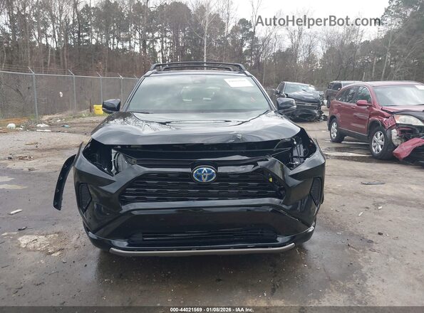 JTM16RFV1ND074960 2022 TOYOTA RAV4 HYBRID Black Vista interior trasera