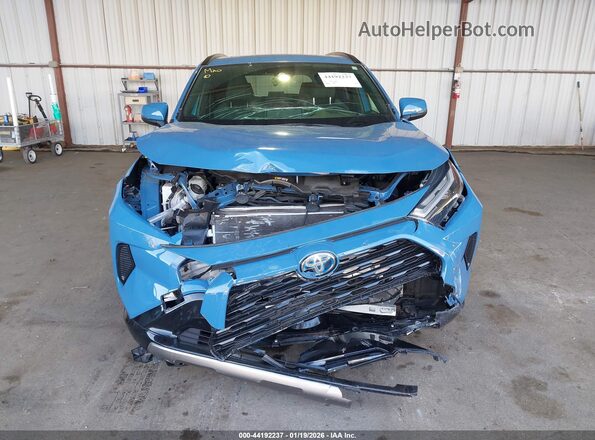 JTM16RFV6PD107194 2023 TOYOTA RAV4 HYBRID Blue Widok wnętrza z tyłu
