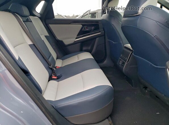 JTMABABAXSA093262 2025 SUBARU SOLTERRA Teal Widok wnętrza z tyłu