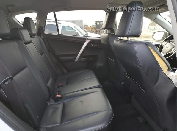 JTMDFREV6GJ068655 2016 TOYOTA LIMITED White Widok tylnych siedzeń