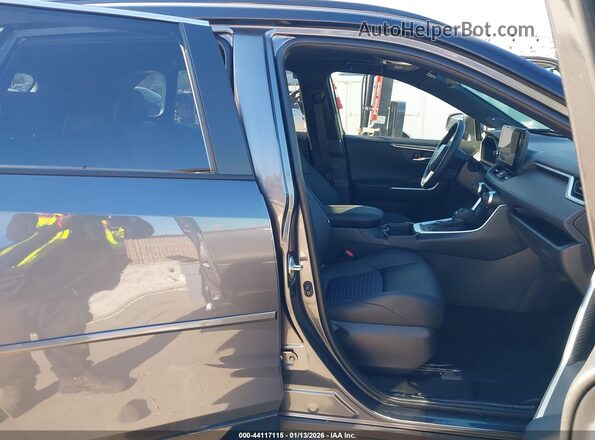 JTME6RFV8SD582002 2025 TOYOTA RAV4 HYBRID Gray Front interior view