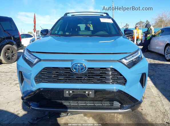 JTME6RFV9ND528633 2022 TOYOTA RAV4 HYBRID Синий Вид задней части салона